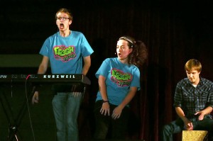 Andrew Carlson and Bethany Tompkins, assisted by Cory Austin, rapped a parody of the Fresh Prince of Bel Air theme song at the freshman class talent show, Frosh Frolics, Thursday, Oct. 10. Photo by Morgan Schlief.