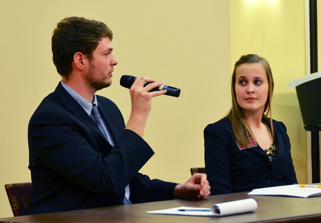 Alyssa Coop and Dan Remes defend their platform agenda at a debate before the election. Coop and Remes were elected SGA President and Vice President. Photo by Liv Ulring.