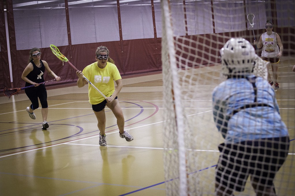 The women’s lacrosse team practices on weekdays and on weekends. They enjoy their practice time to get some exercise and bond as a team. Photo by Bobby Person.