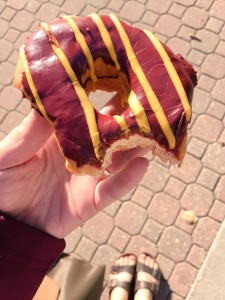 One of Sandy’s Cobber-themed Donuts decorated in maroon and gold icing. Photo submitted by Alison Broman.