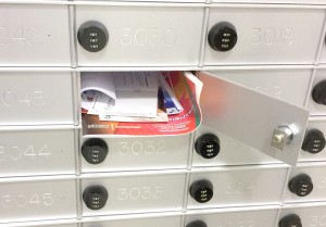 A neglected PO box, stuffed with mail. Photo by Alyssa Armstrong.