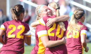 Sadie Hayes rejoices with a teammate after a goal during Saturday's game. Photo courtesy of the Concordia Sports Information Office.