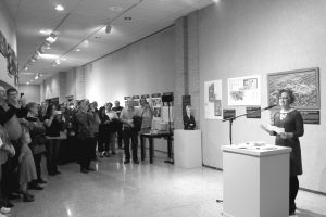 Archivist Lisa Sjoberg welcomes colleagues, alumni and students to the 125th Concordia anniversary exhibit. After three years of research and planning the exhibit, Sjoberg can finally present it to the public. Photo taken by Kaley Sievert.