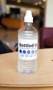 Sustainability, Bottled Water on Table WEB - Chase Body