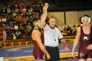 Junior Jake Krogstad is named winner against his opponent at the Bison Open last Saturday. Head coach Matt Nagel says one of the team's strengths this year is the team's tight bond. Submitted photo.