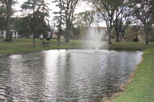 Facilities pumps city water into Prexy’s Pond. Photo by Reilly Myklebust.