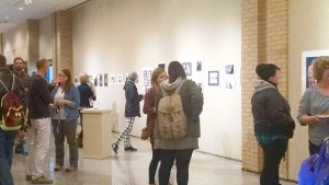 Students gather in Cyrus M. Running Gallery during the opening of the exhibition. Photo by Kaley Sievert.