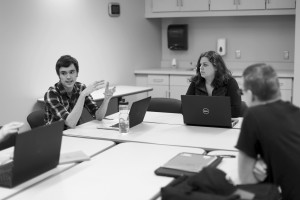 ￼Co-Presidents Colin Johnson and Madison Lindquist discuss an exercise for writing action scenes. Photo by Maddie Malat.