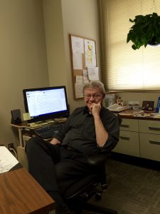 Jack Zaleski sits in his office at The Forum. Photo by Marit Johnson.
